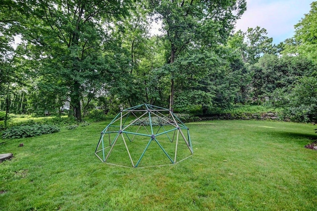 3590 Sabaka Trl, Verona, WI 53593 - view of green lawn featuring a forest view