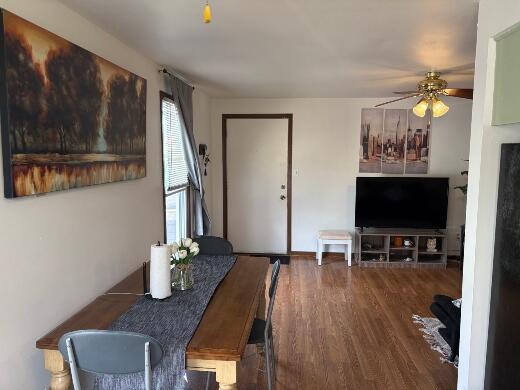 2408 Park Pl Unit D, Sheboygan, WI 53083 - dining area with a ceiling fan and wood finished floors