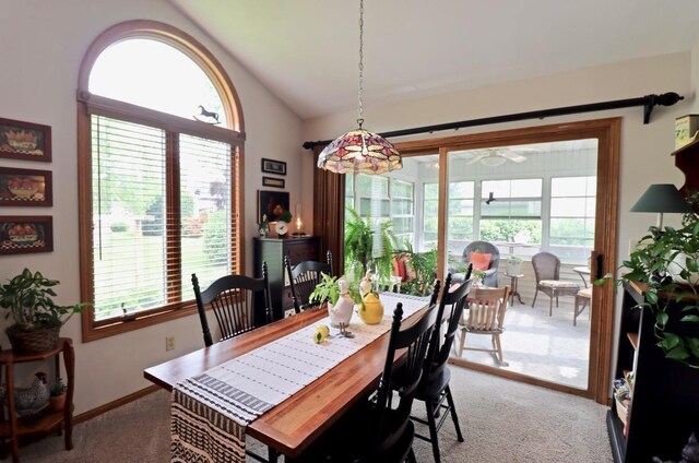 2360 Cobblestone Ln, Beloit, WI 53511 - dining area with light carpet, lofted ceiling, and a ceiling fan