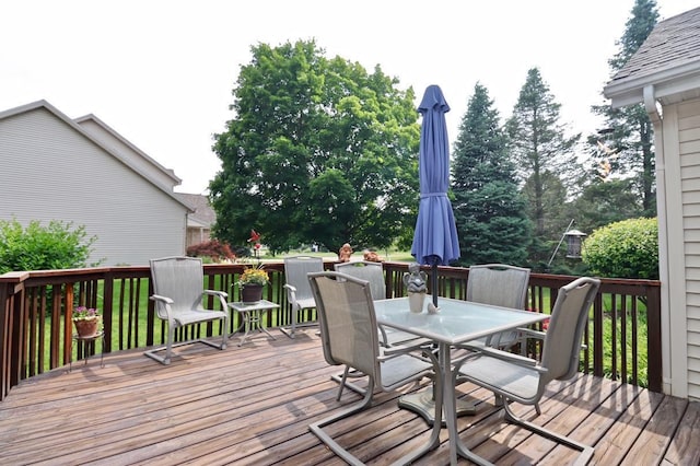 2360 Cobblestone Ln, Beloit, WI 53511 - wooden terrace featuring outdoor dining area
