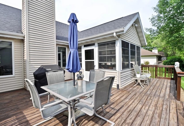 2360 Cobblestone Ln, Beloit, WI 53511 - deck featuring outdoor dining area, a sunroom, and grilling area