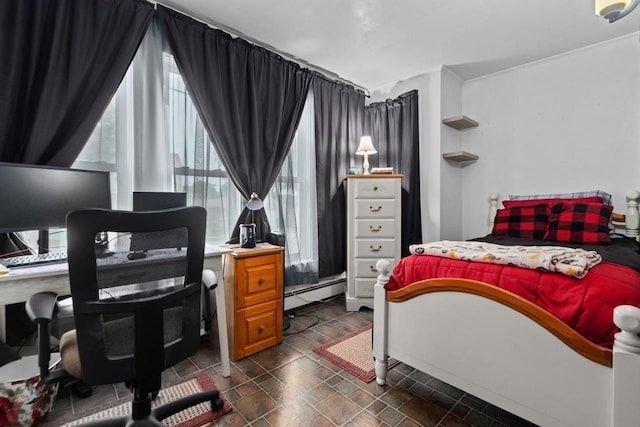 814 Quinney Ave, Kaukauna, WI 54130 - bedroom featuring multiple windows, a baseboard heating unit, and a desk
