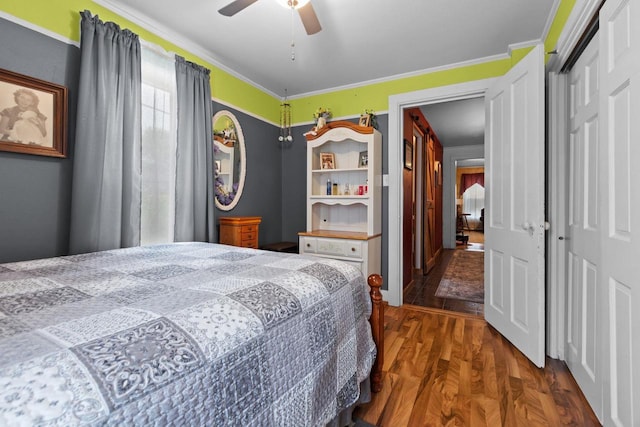 814 Quinney Ave, Kaukauna, WI 54130 - bedroom with a closet, wood finished floors, a ceiling fan, and ornamental molding