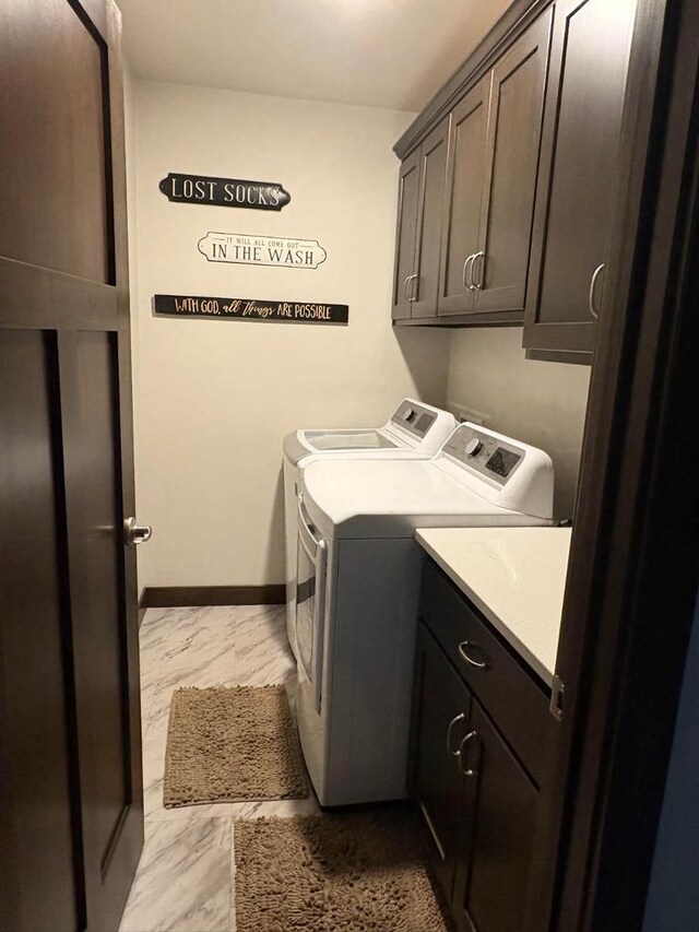 4842 N Marlo Way Unit 35, Appleton, WI 54913 - laundry area featuring light marble finish floors, cabinet space, and separate washer and dryer