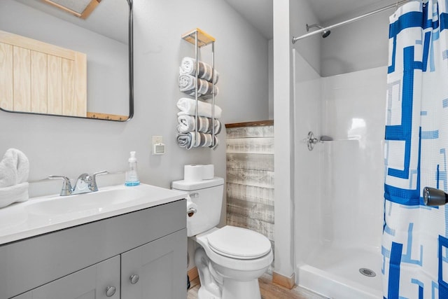 9347 Musky Bay Ln, Harshaw, WI 95429 - bathroom with vanity, a shower with curtain, and wood finished floors