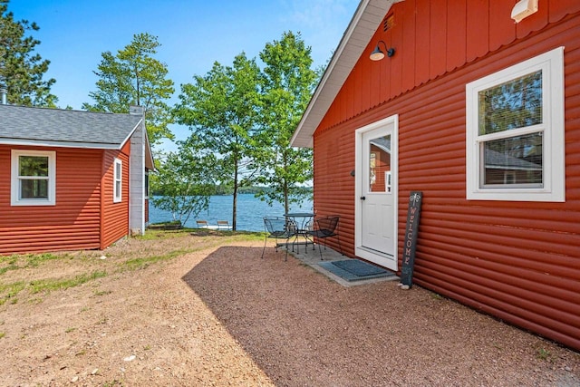 9347 Musky Bay Ln, Harshaw, WI 95429 - view of yard with a water view and a patio