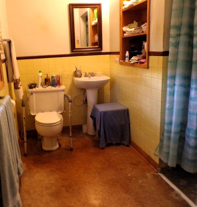 210 W S St, Loyal, WI 54446 - full bathroom with wainscoting, tile walls, and a shower with curtain