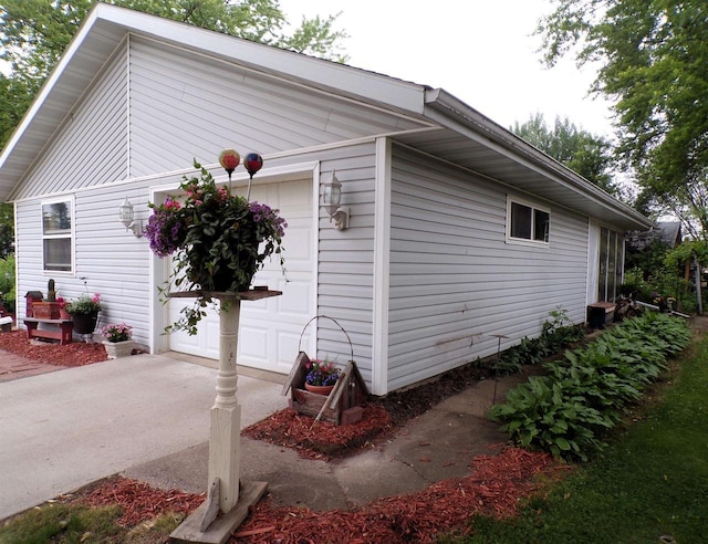 210 W S St, Loyal, WI 54446 - view of property exterior featuring a garage