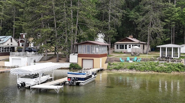 N2817 Rustic Dr, Clintonville, WI 54929 - dock featuring a water view and a wooded view