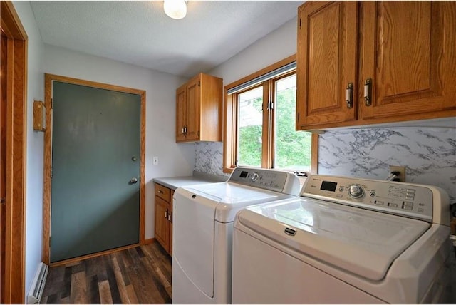 W5342 County Highway F, Trego, WI 54888 - washroom featuring cabinet space, independent washer and dryer, and dark wood-type flooring