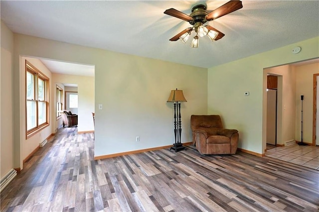 W5342 County Highway F, Trego, WI 54888 - sitting room with wood finished floors and a ceiling fan