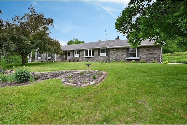 W5342 County Highway F, Trego, WI 54888 - ranch-style home featuring stone siding and a front yard