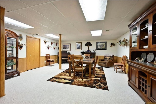W5342 County Highway F, Trego, WI 54888 - dining room with carpet floors, a drop ceiling, and wainscoting