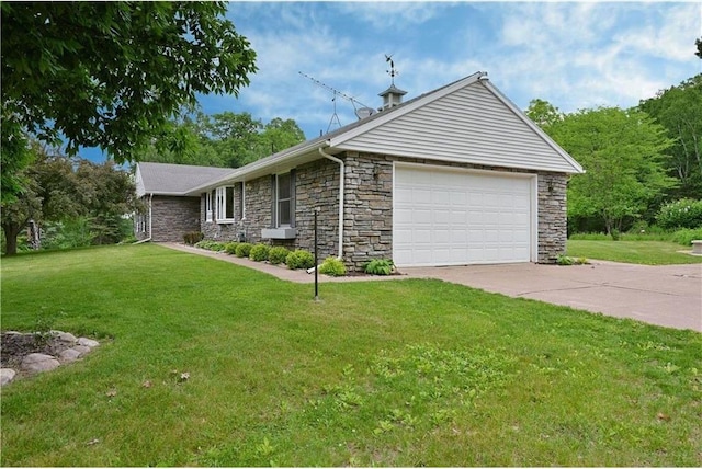 W5342 County Highway F, Trego, WI 54888 - view of front of property with stone siding, a front lawn, a garage, and concrete driveway