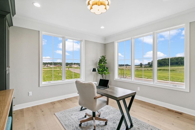 5928 Burning Prairie Dr, Waunakee, WI 53597 - home office featuring plenty of natural light, light wood-style flooring, ornamental molding, a chandelier, and recessed lighting