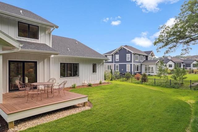 5928 Burning Prairie Dr, Waunakee, WI 53597 - view of yard with a wooden deck, a residential view, and outdoor dining space