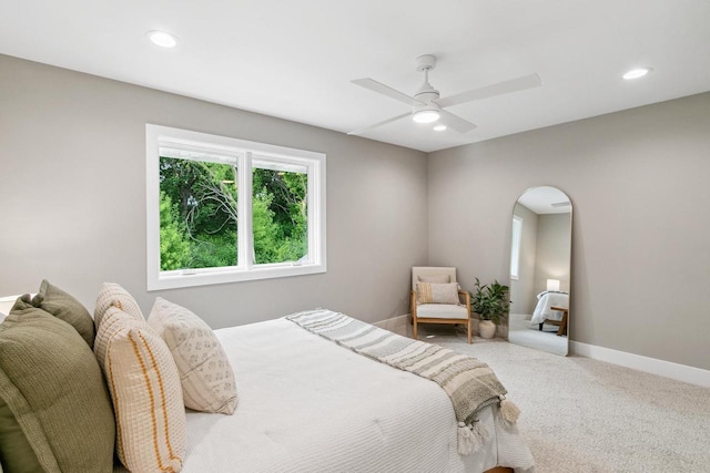 5928 Burning Prairie Dr, Waunakee, WI 53597 - carpeted bedroom featuring arched walkways, recessed lighting, and ceiling fan