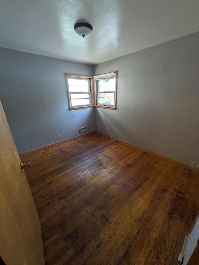 2759 N 57th St Unit 2761, Milwaukee, WI 53210 - unfurnished room with wood finished floors and baseboards