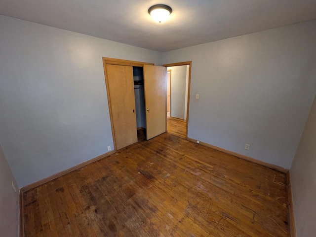 2759 N 57th St Unit 2761, Milwaukee, WI 53210 - unfurnished bedroom with hardwood / wood-style floors and a closet