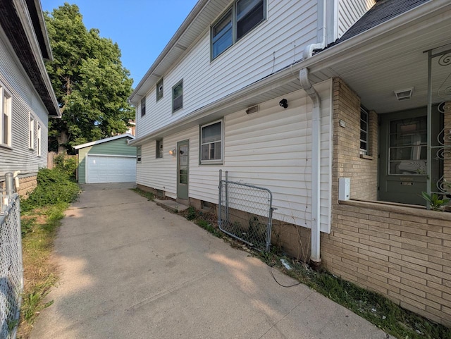 2759 N 57th St Unit 2761, Milwaukee, WI 53210 - view of property exterior with an outbuilding and a garage