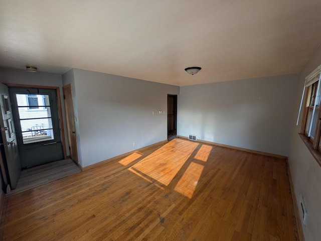 2759 N 57th St Unit 2761, Milwaukee, WI 53210 - empty room featuring light wood-style floors and baseboards