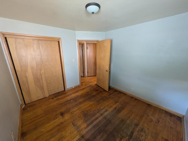 2759 N 57th St Unit 2761, Milwaukee, WI 53210 - unfurnished bedroom with wood finished floors and a closet