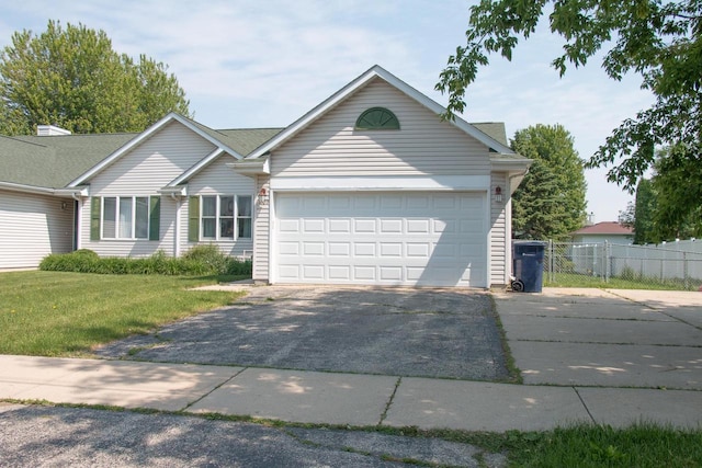 4303 E Milwaukee St Unit B, Janesville, WI 53546 - ranch-style home with driveway and a garage