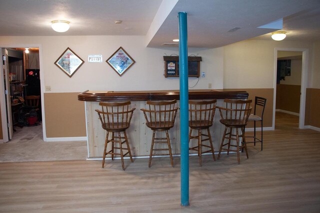 4303 E Milwaukee St Unit B, Janesville, WI 53546 - indoor dry bar with wood finished floors and baseboards