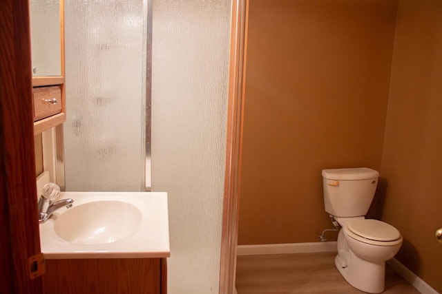 4303 E Milwaukee St Unit B, Janesville, WI 53546 - bathroom featuring vanity and wood finished floors