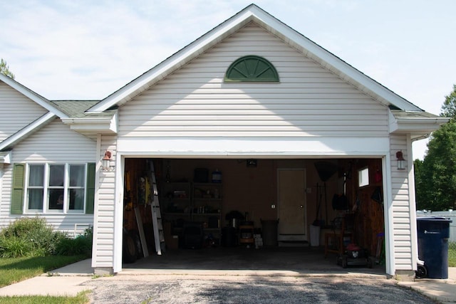 4303 E Milwaukee St Unit B, Janesville, WI 53546 - garage featuring asphalt driveway