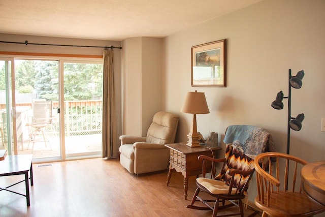 4303 E Milwaukee St Unit B, Janesville, WI 53546 - sitting room featuring wood finished floors