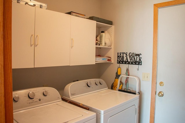 4303 E Milwaukee St Unit B, Janesville, WI 53546 - laundry area featuring washing machine and clothes dryer and cabinet space
