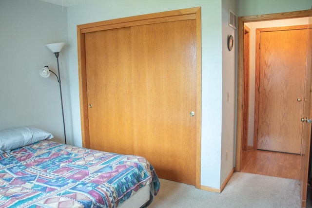 4303 E Milwaukee St Unit B, Janesville, WI 53546 - carpeted bedroom with a closet and baseboards