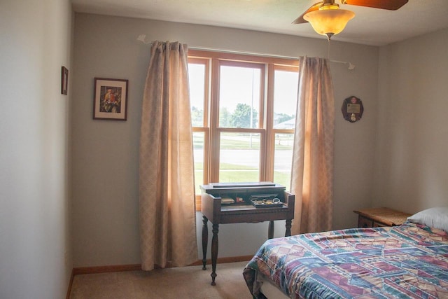 4303 E Milwaukee St Unit B, Janesville, WI 53546 - carpeted bedroom featuring baseboards and a ceiling fan