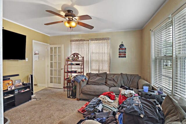 7732 15th Ave, Kenosha, WI 53143 - living area featuring a ceiling fan, carpet floors, crown molding, and french doors
