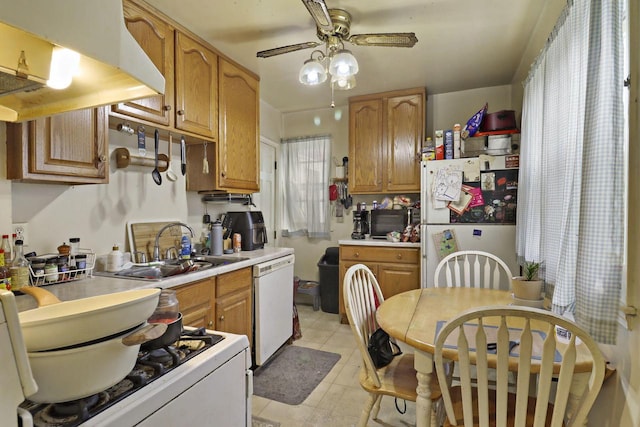 7732 15th Ave, Kenosha, WI 53143 - kitchen with white appliances, extractor fan, a ceiling fan, light countertops, and brown cabinets