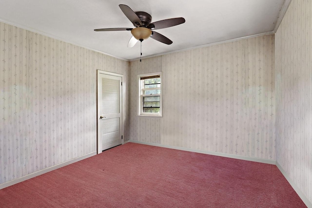 7732 15th Ave, Kenosha, WI 53143 - empty room featuring a ceiling fan, ornamental molding, and carpet flooring