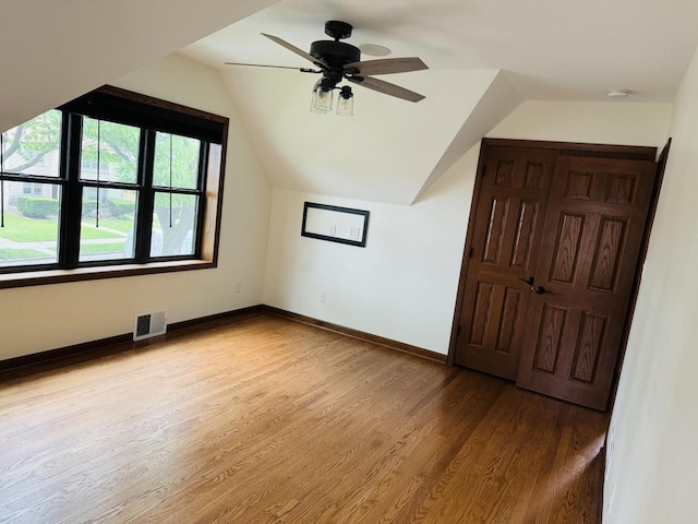 3441 N 55th St, Milwaukee, WI 53216 - bonus room with wood finished floors, lofted ceiling, and ceiling fan