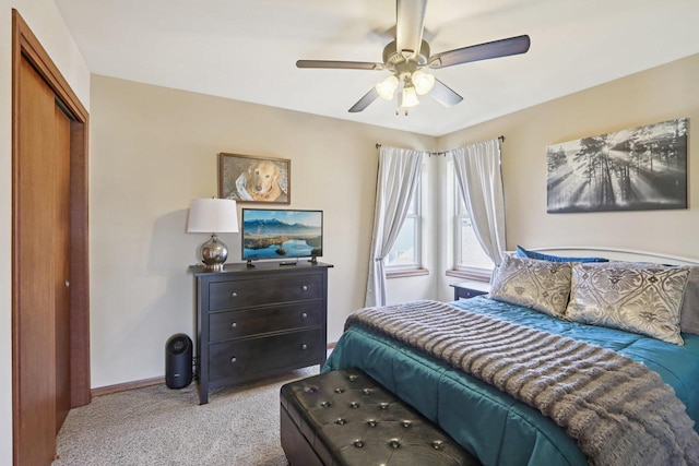 7042 Littlemore Dr, Madison, WI 53718 - bedroom with carpet, a closet, and a ceiling fan