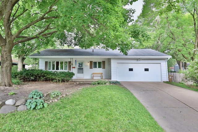 2413 Ravenswood Rd, Madison, WI 53711 - ranch-style house with a garage, driveway, and a porch