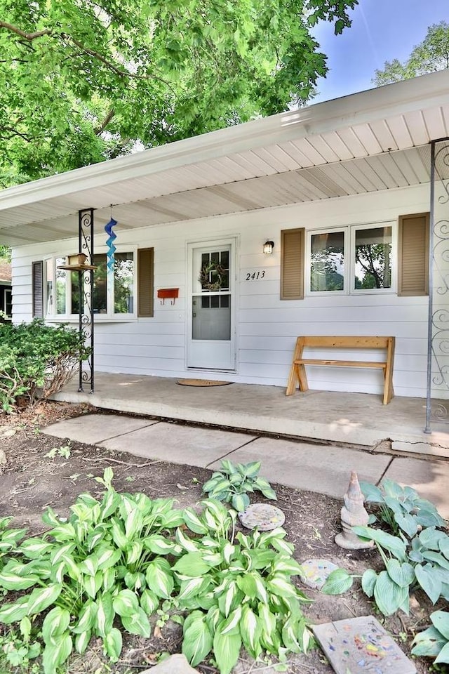 2413 Ravenswood Rd, Madison, WI 53711 - property entrance with a porch