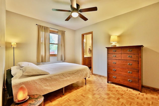 2413 Ravenswood Rd, Madison, WI 53711 - bedroom with connected bathroom and ceiling fan