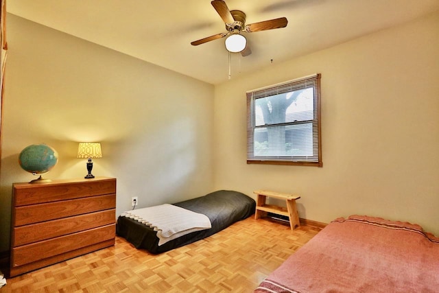 2413 Ravenswood Rd, Madison, WI 53711 - bedroom with ceiling fan and baseboards