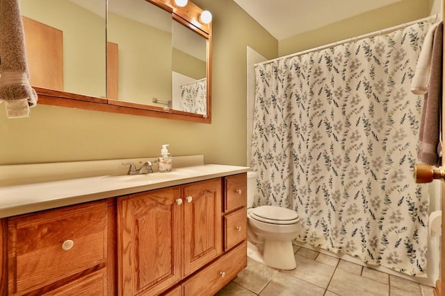 2413 Ravenswood Rd, Madison, WI 53711 - full bathroom with vanity, tile patterned floors, and a shower with curtain