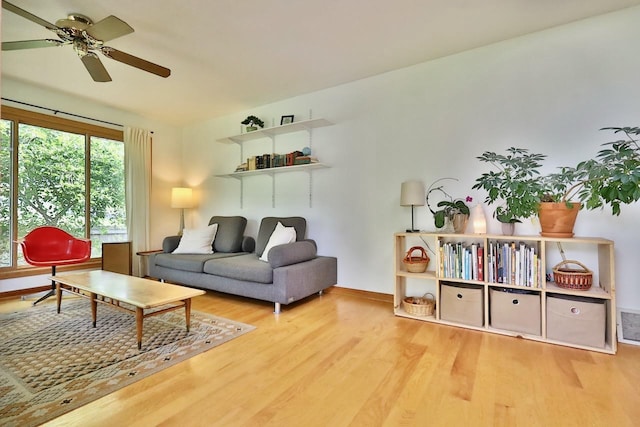 2413 Ravenswood Rd, Madison, WI 53711 - living area with wood finished floors and ceiling fan