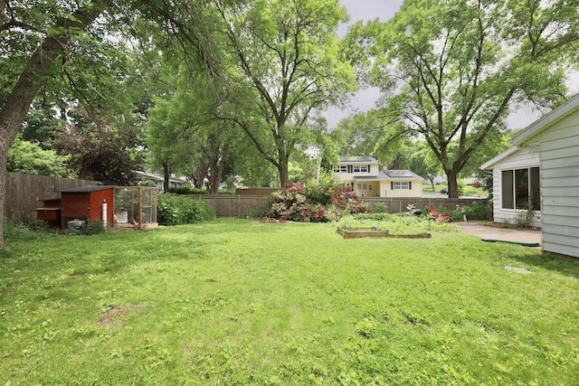 2413 Ravenswood Rd, Madison, WI 53711 - fenced backyard with a garden