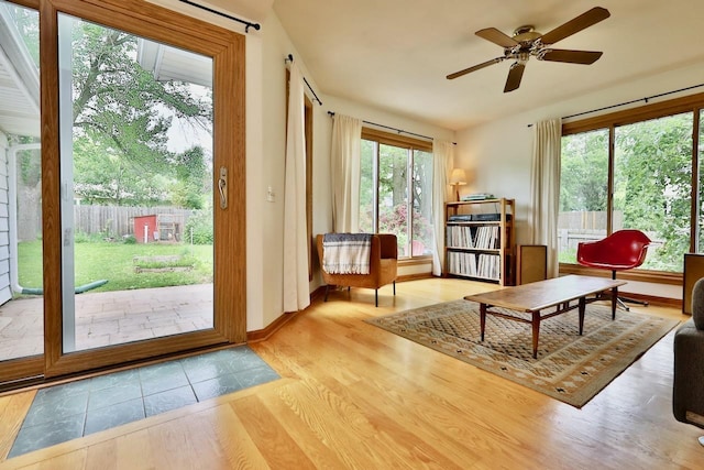 2413 Ravenswood Rd, Madison, WI 53711 - sitting room featuring a ceiling fan and wood finished floors