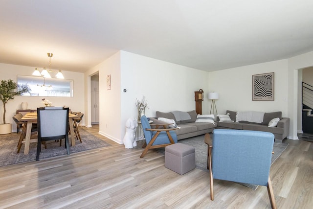 8725 N Fielding Rd, Bayside, WI 53217 - living room with light wood-type flooring and a chandelier
