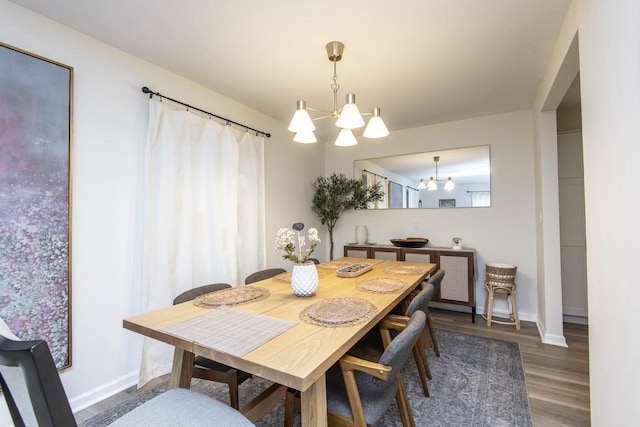 8725 N Fielding Rd, Bayside, WI 53217 - dining room with a chandelier and wood finished floors