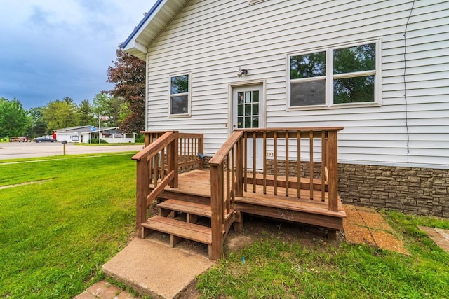 2941 Plover Rd, Wisconsin Rapids, WI 54494 - wooden deck featuring a yard